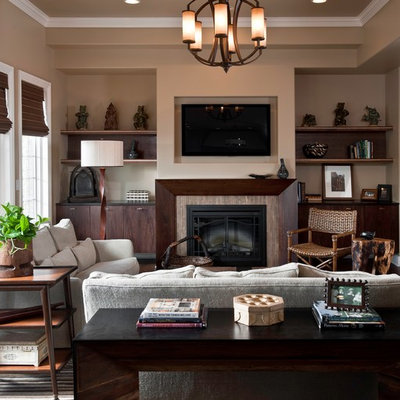 Mid-sized trendy open concept dark wood floor and brown floor living room photo in Chicago with beige walls, a standard fireplace, a tile fireplace and a media wall