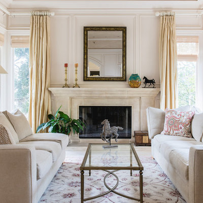 Living room - large traditional formal and enclosed living room idea in San Francisco with beige walls, a standard fireplace, a stone fireplace and no tv