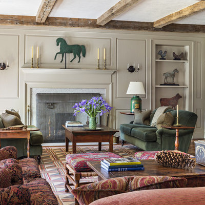 Living room - huge country medium tone wood floor living room idea in New York with multicolored walls, a standard fireplace, a stone fireplace and a concealed tv