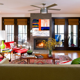 Inspiration for a contemporary living room remodel in Boston with a standard fireplace