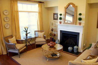 Inspiration for an eclectic living room remodel in Richmond with yellow walls