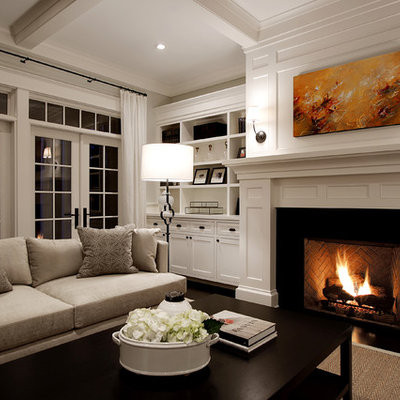 Example of a large classic living room design in Seattle with white walls and a standard fireplace
