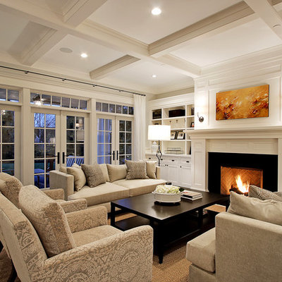Example of a huge classic dark wood floor living room design in Seattle with a standard fireplace, no tv and white walls