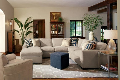 Living room - mid-sized contemporary open concept medium tone wood floor living room idea in Los Angeles with beige walls