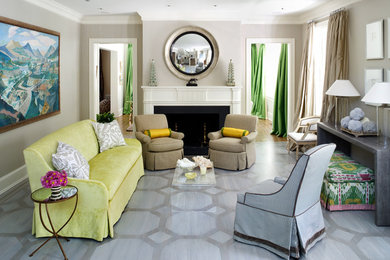 Inspiration for a contemporary living room remodel in DC Metro with beige walls and a standard fireplace