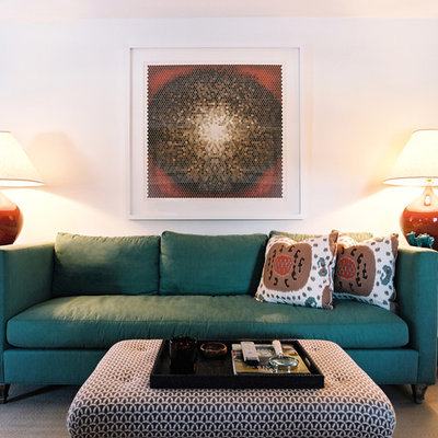 Example of an eclectic living room design in New York with white walls