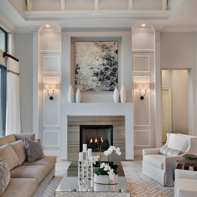Living room - transitional formal and enclosed living room idea in Miami with gray walls and a standard fireplace