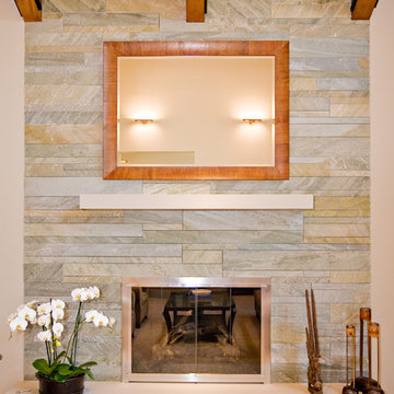 living room with fireplace by master stonemason