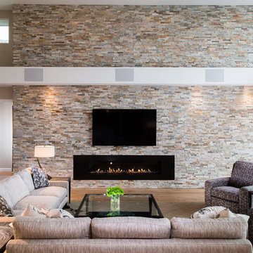 Living Room with Stone Wall Backdrop & Ribbon Fireplace