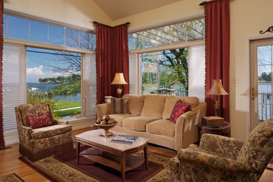 Example of a mid-sized transitional formal and open concept light wood floor living room design in Baltimore with beige walls, a standard fireplace, a tile fireplace and no tv