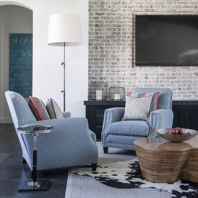 Example of a large eclectic formal and open concept limestone floor living room design in Orlando with white walls and a wall-mounted tv