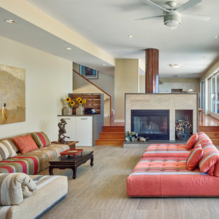 Inspiration for a coastal formal and open concept beige floor living room remodel in New York with beige walls and a standard fireplace