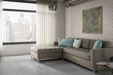 Mid-sized urban formal and open concept gray floor living room photo in New York with white walls, no fireplace and no tv