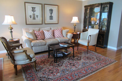 Design ideas for a medium sized modern open plan living room in Chicago with light hardwood flooring.