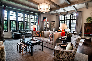 Large trendy open concept dark wood floor living room photo in Charleston with beige walls