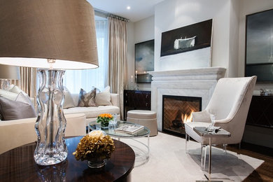 Trendy living room photo in Toronto with a standard fireplace and a stone fireplace