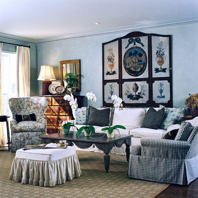 Example of a mid-sized classic dark wood floor living room design in Houston with blue walls