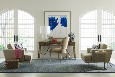 Inspiration for a large contemporary living room in Boston with white walls, light hardwood flooring and no fireplace.