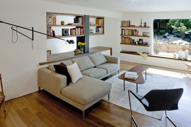Inspiration for a contemporary living room remodel in San Francisco with white walls