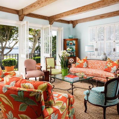 Inspiration for a large tropical open concept and formal living room remodel in Miami with blue walls