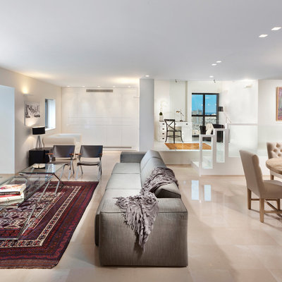 Living room - contemporary open concept living room idea in Other with white walls