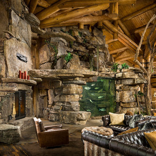Mountain style open concept living room photo in Other with a corner fireplace and a stone fireplace