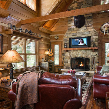 Log home with barn wood and Western decor