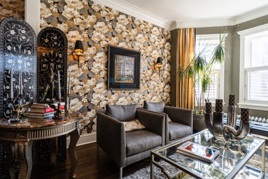 Example of a classic formal dark wood floor and brown floor living room design in Boston with multicolored walls, no fireplace and no tv