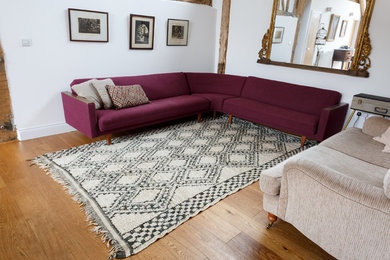 Design ideas for a midcentury living room in Essex.