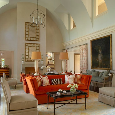 Example of a classic formal and enclosed living room design in Detroit with beige walls, a standard fireplace and no tv