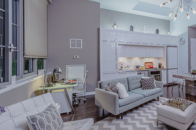 Living room - transitional open concept dark wood floor living room idea in New York with gray walls