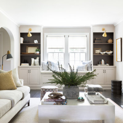 Inspiration for a transitional formal and open concept dark wood floor and brown floor living room remodel in New York with white walls, a standard fireplace, a tile fireplace and no tv