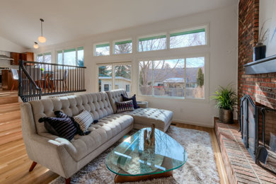 Transitional living room photo in Denver
