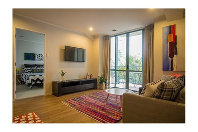 Living room - modern living room idea in Auckland