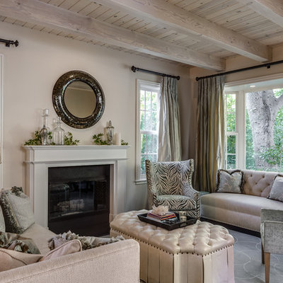 Living room - traditional formal living room idea in San Francisco with beige walls and a standard fireplace