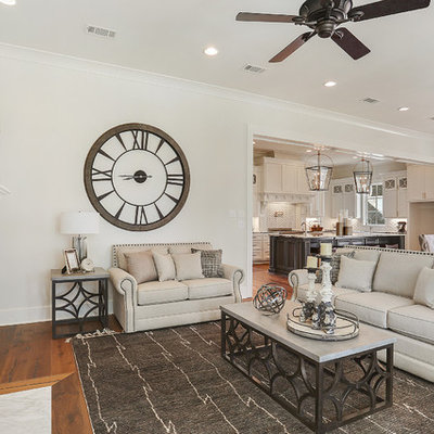 Living room - mid-sized transitional formal and open concept dark wood floor and brown floor living room idea in New Orleans with white walls, a standard fireplace, a stone fireplace and no tv