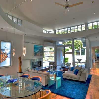 Inspiration for a large modern open concept living room remodel in San Francisco with a ribbon fireplace