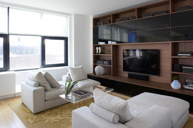 Contemporary living room in New York with a built-in media unit.