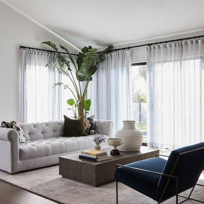 Inspiration for a contemporary dark wood floor and brown floor living room remodel in Los Angeles with gray walls