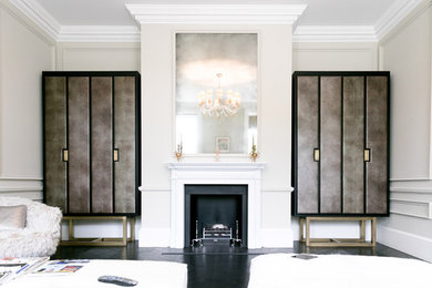 Medium sized contemporary formal open plan living room in London with white walls, dark hardwood flooring, a standard fireplace, a stone fireplace surround and a built-in media unit.