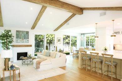 Example of a farmhouse living room design in San Diego