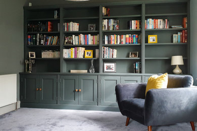 Inspiration for a large traditional enclosed living room in Cheshire with green walls, carpet and grey floors.