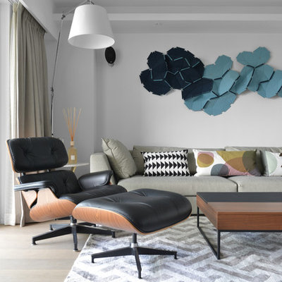 Inspiration for a scandinavian formal and open concept light wood floor living room remodel in Hong Kong with white walls