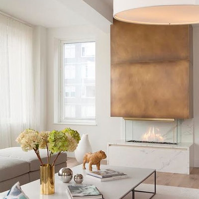 Living room - mid-sized scandinavian formal and enclosed light wood floor living room idea in New York with white walls, a two-sided fireplace and a stone fireplace