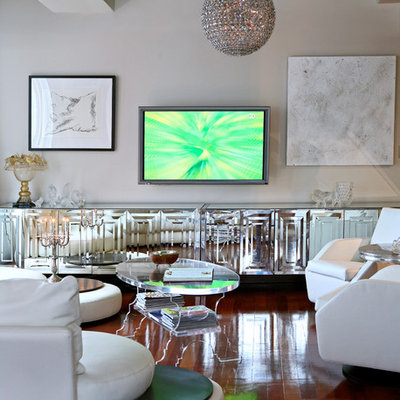 Example of a trendy open concept dark wood floor living room design in New York with gray walls and a wall-mounted tv
