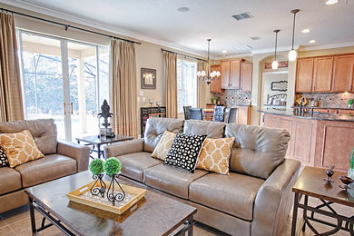 Mid-sized elegant open concept ceramic tile and beige floor living room photo in Orlando with beige walls and no fireplace