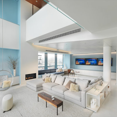 Inspiration for a huge contemporary open concept and formal living room remodel in San Francisco with blue walls, a ribbon fireplace and no tv