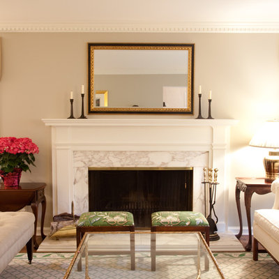 Elegant formal living room photo in Milwaukee with beige walls and a standard fireplace