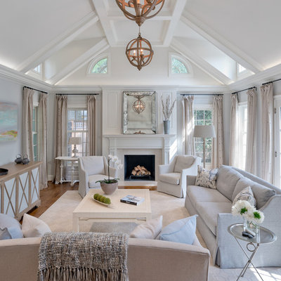Living room - large transitional open concept medium tone wood floor and brown floor living room idea in DC Metro with a standard fireplace, a stone fireplace, a concealed tv and gray walls