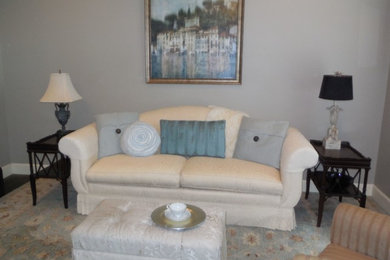 Example of a mid-sized classic enclosed living room design in Little Rock with gray walls